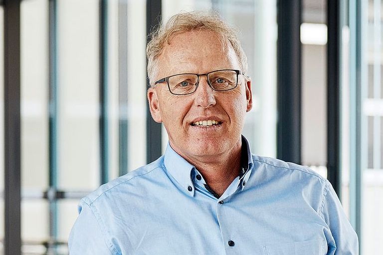 Michael Gerber lächelt.