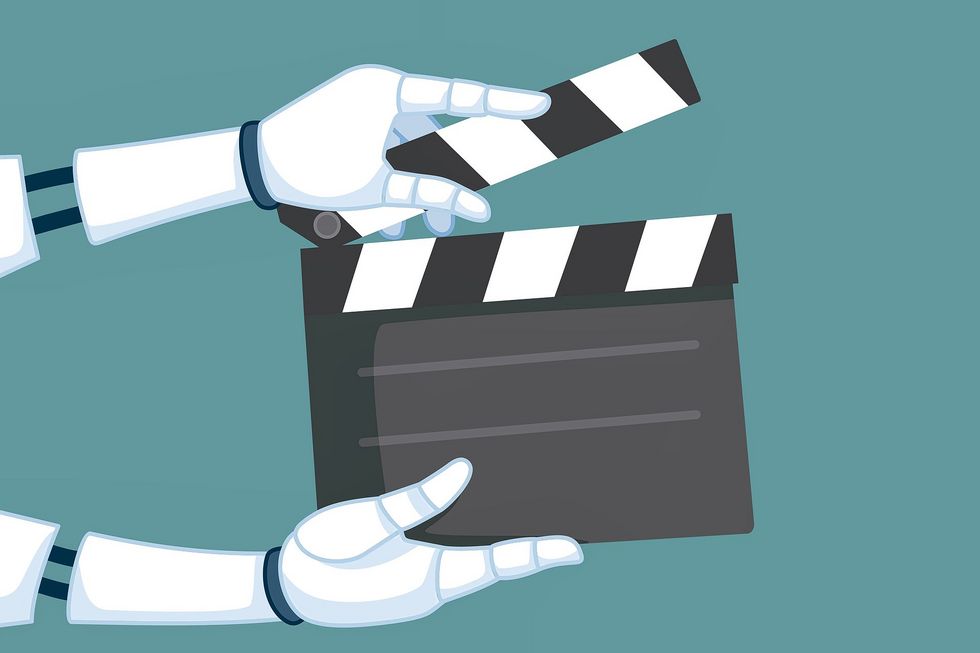 Ein grafisches Bild, das zwei Roboterhände zeigt, die eine Szenenklappe halten.