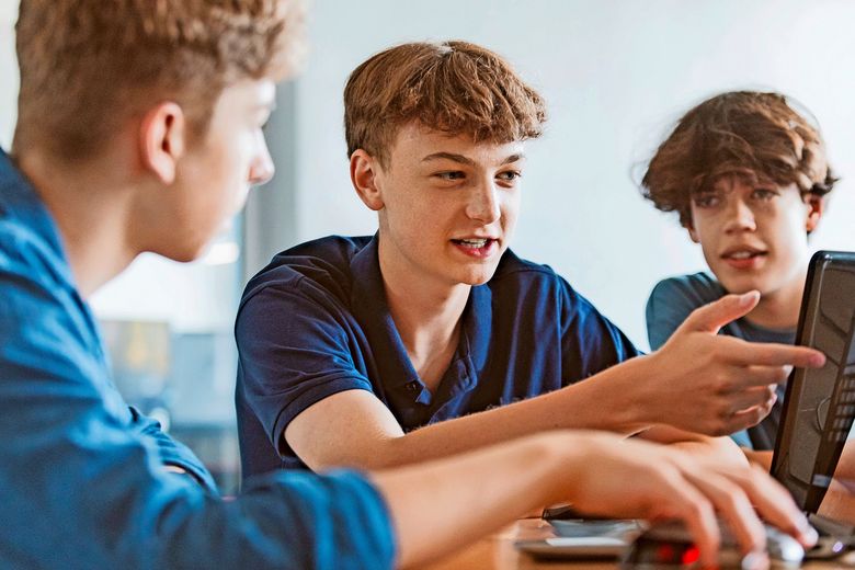 High school student learing coding