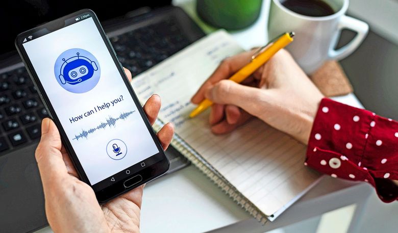 Young business person using system AI Chatbot in computer or mobile application. Chatbot conversation, Ai Artificial Intelligence technology. Futuristic technology. Virtual assistant on internet