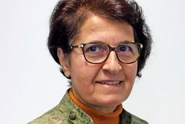 Frau in grünem Jackett