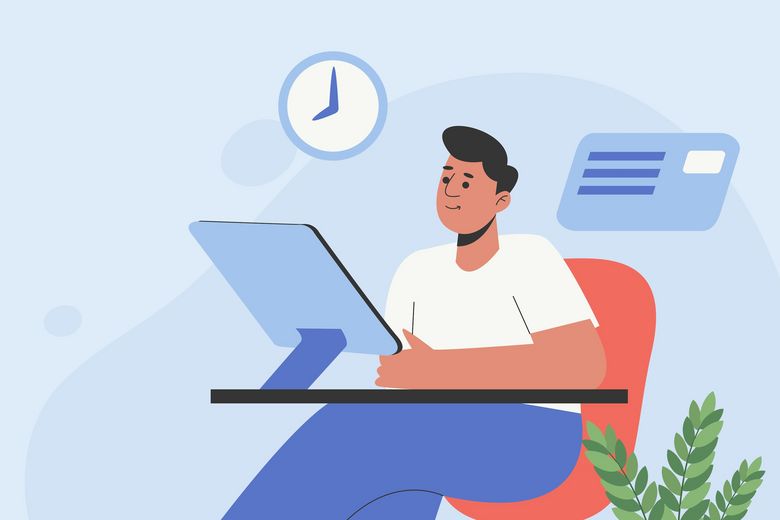 Ein Mann arbeitet an einem Laptop, über ihm erinnert eine Uhr an die Zeit.